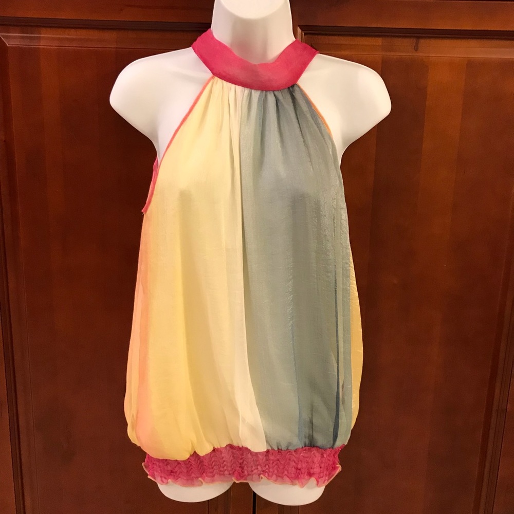 Sleeveless blouse: multi colored.